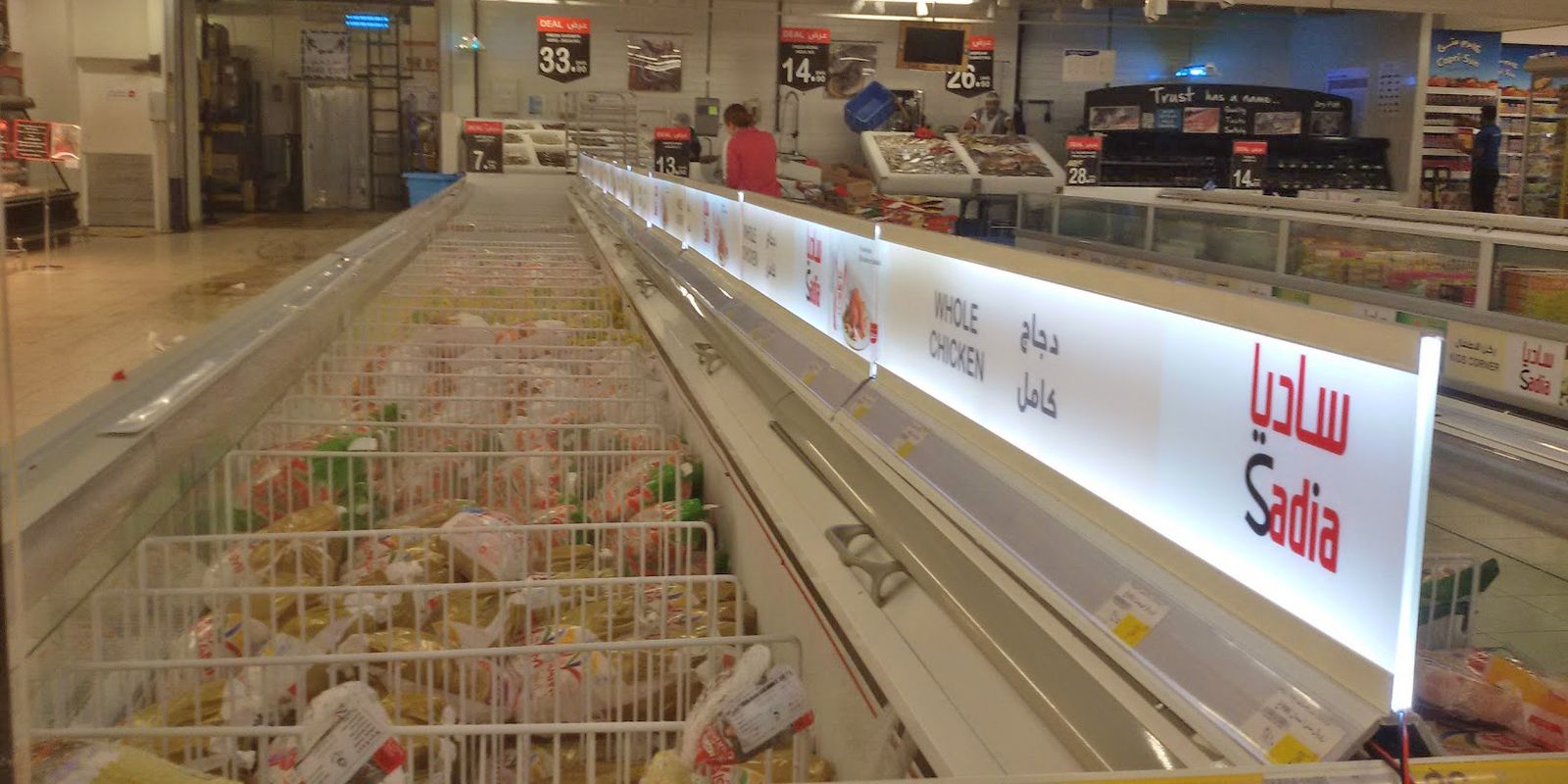 Installed retail campaign graphics and branded chiller panels